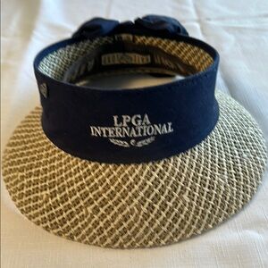Tan and Blue Sun Visor LPGA International. 
New, never worn.